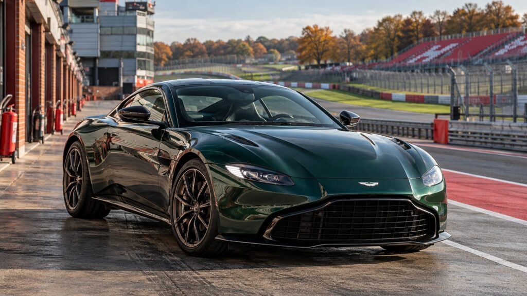 Green Aston Martin in the pit lane for a Brands Hatch festival tickets and centenary guide